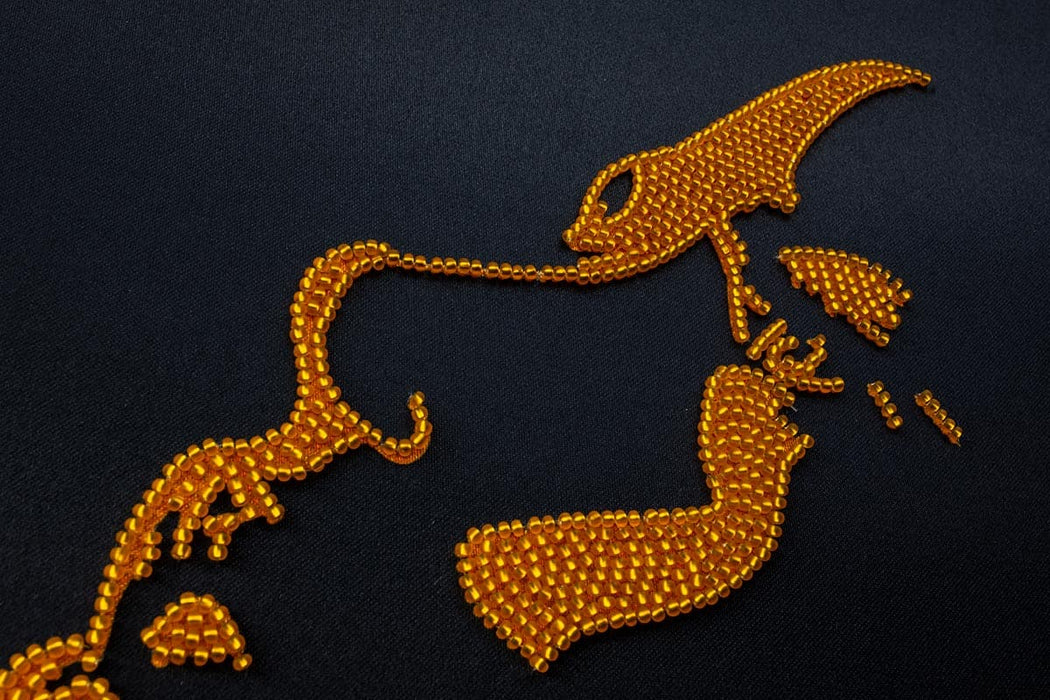 רקמת חרוזים - אישה באור