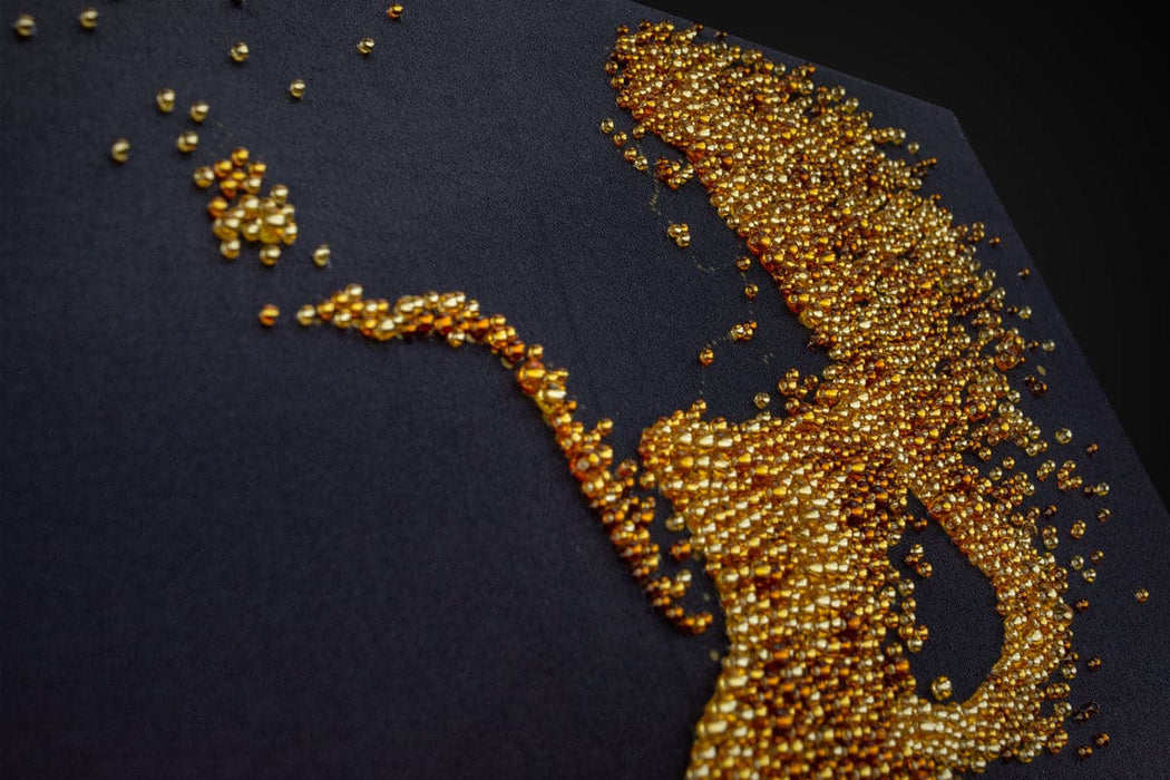 רקמת חרוזים - האישה בזהב