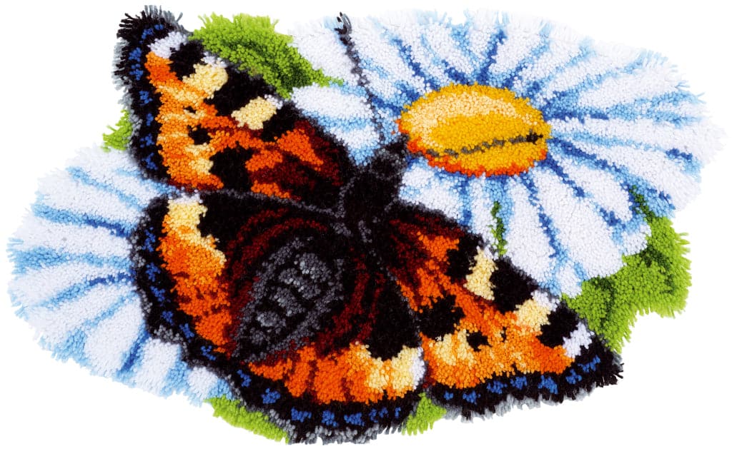הכנת שטיח - פרפרים על פרח